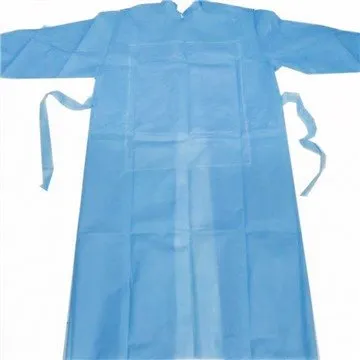 Bagaimanakah gaun pembedahan melindungi pemakai dari percikan kimia?